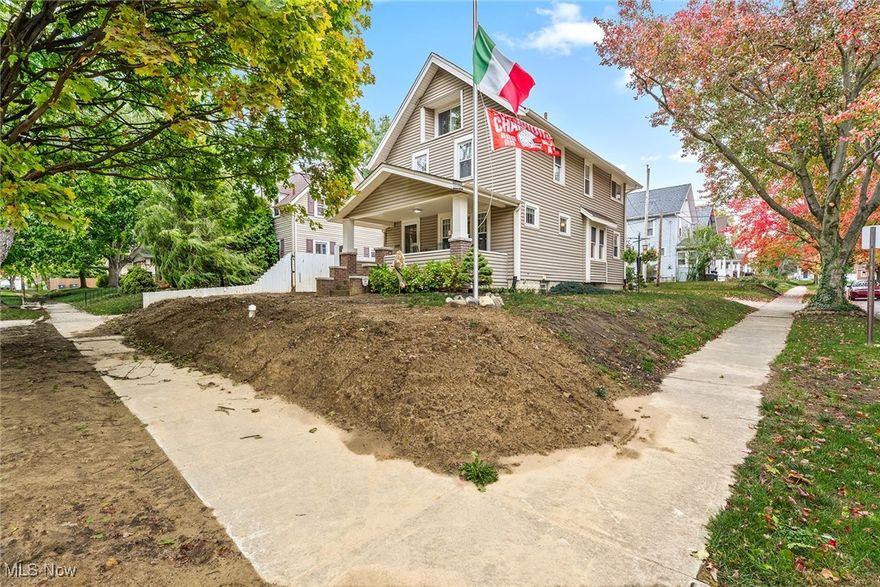 Welcome to 1367 Girard St., a well-maintained 4-bedroom Colonial located on a corner lot in Firestone Park. The covered front porch, updated with new wood planks about six years ago, provides a comfortable spot to relax and enjoy the neighborhood. Inside, the living room features original woodwork, high ceilings, a concrete electric fireplace, and built-in shelving. The living and dining rooms both include decorative ceilings, and the dining area offers a window seat and built-in sideboard. The kitchen and mudroom have ceramic tile flooring, stucco-style walls, stainless steel appliances, and oak cabinets. The mudroom connects conveniently to the kitchen, and can also be used for additional storage. Upstairs, the primary bedroom includes a Venetian plaster ceiling and new carpeting. Two additional bedrooms and a full bathroom with a marble vanity countertop and new lighted mirror complete the second floor. The third floor adds a large fourth bedroom or flexible bonus space measuring 23 x 9 feet. Recent updates include an upgraded electrical panel, some paint, and new siding, roof, and gutters in 2013. This home also has vinyl double-pane windows throughout.  The property includes a 2-car detached garage and an insulated shed with electricity. Located about 18 miles from Akron-Canton Airport, within 9 miles of several golf courses, and just over a mile from the expressway, this home offers easy access to local amenities and commuting routes.