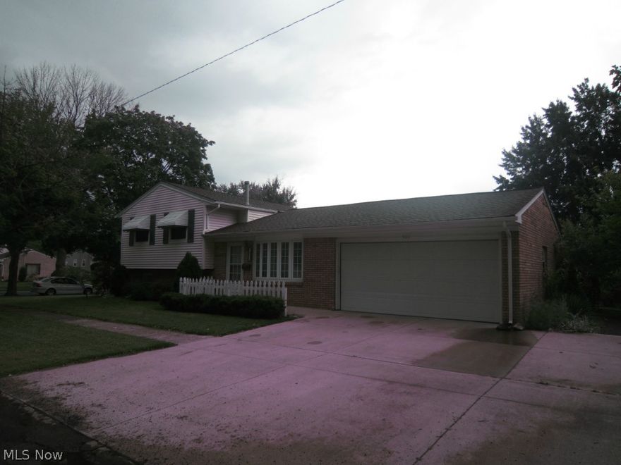 Great Opportunity with this large 3 bedroom split level style home on a residential street in Elyria!  Wonderful curb appeal with the attached 2 car garage with storage, landscaped yard, fenced in backyard, newer vinyl windows throughout, newer roof and gutters -approx 2010, storage shed, brick/vinyl exterior!! This home has a wonderful floor plan with the addition off the back for a cozy family room!  This home is currently being offered at only approx $47/per square foot - does need cosmetic updating...huge lower level finished recreation room as well!!  Three bedrooms with hardwood floors and ample closet space...door from family room to the patio area of backyard...added insulation, two sump pumps and some waterproofing from Northern Ohio Basement Waterproofing, Inc (will supply receipt)...Goodman Forced air gas furnace - 2007, Lux Air conditioning - 2011, vaulted ceiling Living Room with natural lighting...Just needs some cosmetic work...call for your personal appointment today -