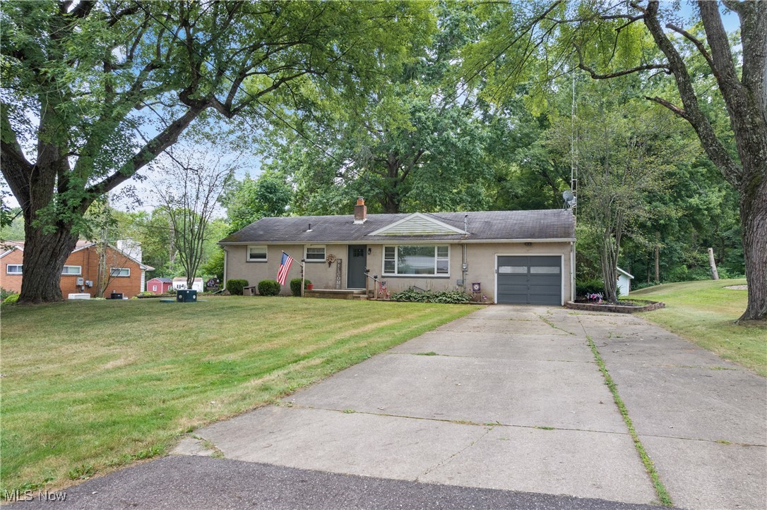 Welcome to 256 Laramie St, Alliance, OH – a charming brick ranch nestled on a quiet, low-traffic street offering peace, privacy, and plenty of potential. This well-maintained home features 3 spacious bedrooms, 1.5 bathrooms, and multiple living areas, perfect for both everyday living and entertaining. Step inside to a bright and open dining room that can be used as a living room - and flows into the functional kitchen. Just beyond, you’ll find a cozy family room complete with a wood-burning fireplace and sliding glass doors that open to an expansive stamped concrete patio, ideal for enjoying morning coffee or hosting guests on warm evenings. The full, unfinished basement provides abundant storage or the opportunity to create additional living space. Outside, the generous backyard offers privacy, a storage shed, and plenty of room to play or garden. With its warm character, flexible layout, and desirable location in the Marlington School District, this home is perfect for first-time buyers, downsizing, or anyone looking for comfort and convenience at a great value. Don’t miss out—this home won't last long!