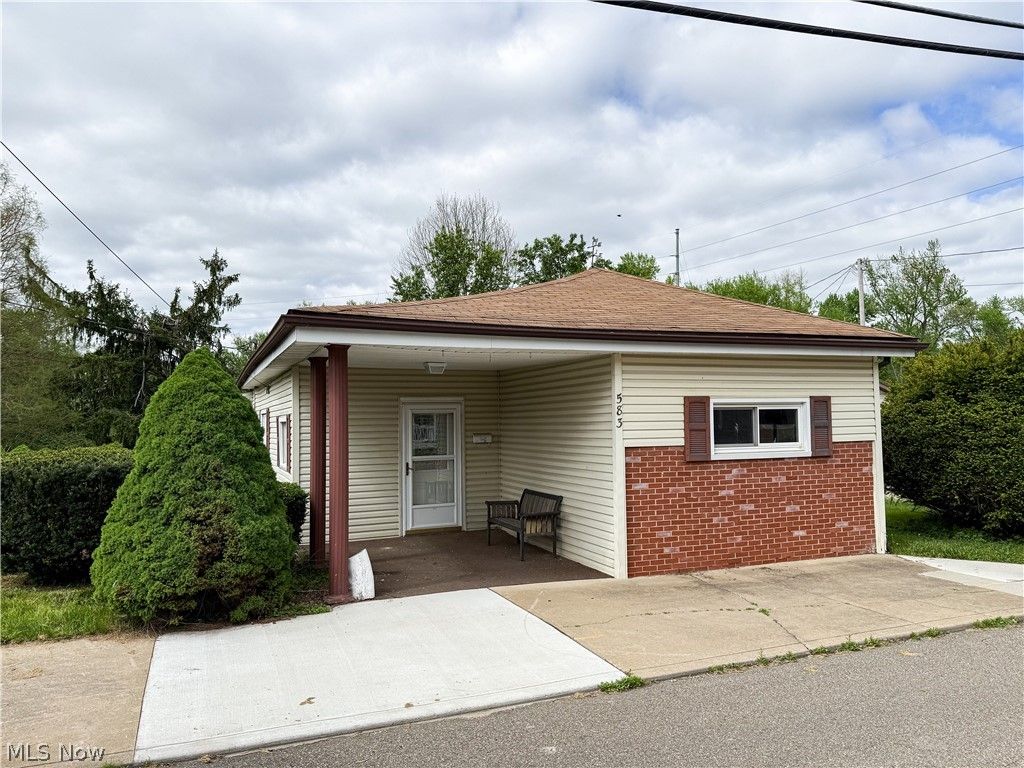 Photo of 583 E 1st Street, Uhrichsville, OH 44683 (MLS # 5209524)