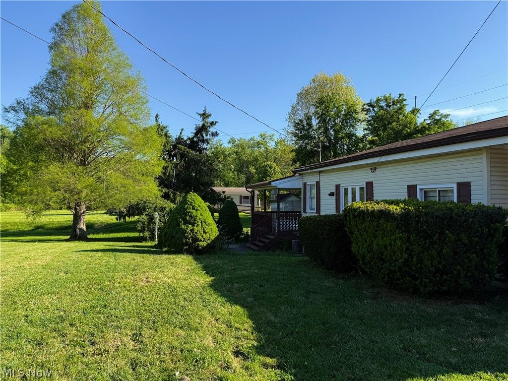 Photo of 583 E 1st Street, Uhrichsville, OH 44683 (MLS # 5209524)