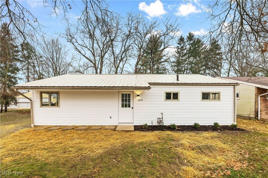 Beautiful!! Renovated ranch just minutes from Whole Foods, coffee shops, and easy access to 77.  Enjoy cooking or baking in the  updated kitchen complete with solid wood, custom,  soft close cabinets, large sink and dishwasher, and a large walk in pantry.  The home includes new mouldings, flooring,  fixtures , and a new bathroom with custom tile. Large windows allow for plenty of natural light.  Moving outside, the exterior has new siding, a new roof, new main electrical service and electrical panel, exterior doors, and landscaping. A large patio is accessed by sliding doors off the living room, making it an ideal space for summer entertaining.