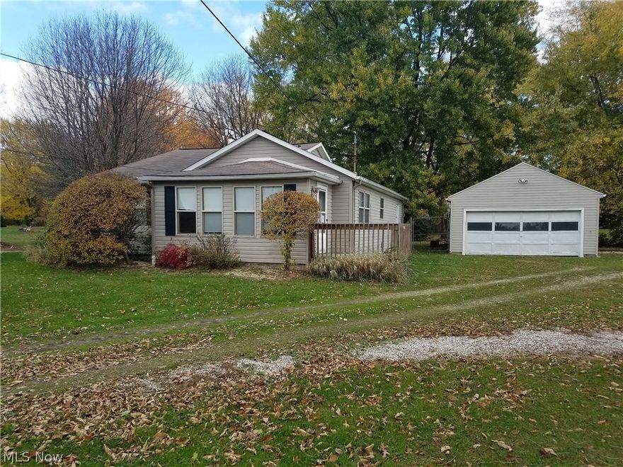 Nice little 3 bedroom ranch that sits back off the road with a 2 car garage and a fenced in back yard.  Has a lot going for it but could use some TLC.