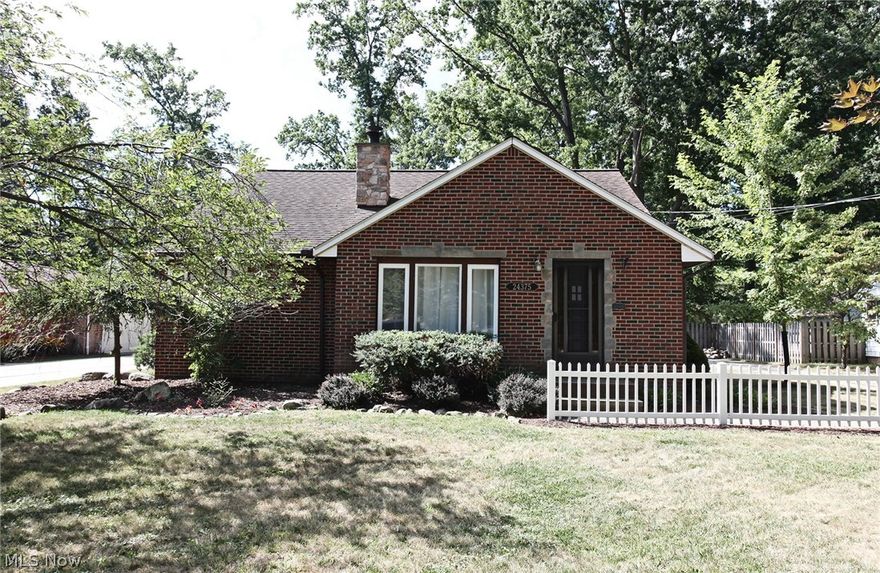 Charming bungalow set on a large, private lot in desirable Westlake Ohio. Meticulously maintained and updated home features gorgeous hardwood flooring, new carpet and fresh paint. Bathrooms have been remodeled to today's standards with a double vanity, custom title work and ceramic. Spacious eat-in kitchen offers functionality and abundant natural light. The dining area is set off the kitchen and opens to the newer living room with a lovely fireplace of stone work showcased floor to ceiling. A new and lovely staircase leads you up to the additional living space which offers endless possibilities with the large open space and abundant storage. Downstairs has 2 additional bedrooms and the master bedroom with walk in closets. As you head out to the spacious backyard, walk through the accommodating mudroom with a half bath. Outdoor enjoyment will be had on nearly half an acre of private, quiet, serene landscape and a deck. 2 car garage with attic storage wraps up this tour. Location is per