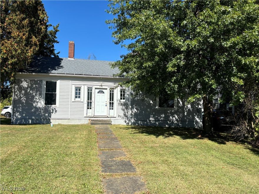 This 3 bedroom home is just waiting for your personal touch. If you are looking for a convenient location, this is it!
A charming, large foyer with a decorative fireplace opens into the spacious living room. This could be used as a home office, sitting/reading area, or a continuation of the living room. A coat closet is tucked into the living room. 
You'll have a first floor laundry room off of the kitchen. 
Enjoy family meals and gatherings in the large dining room off of the kitchen.
Check out the new vinyl plank flooring in the dining room, bath, and first floor bedroom. 
You'll enjoy ample storage and workspace in you large 3 car garage.
This home is just a few blocks from both an elementary, and the middle school. And the city park is only one block away.