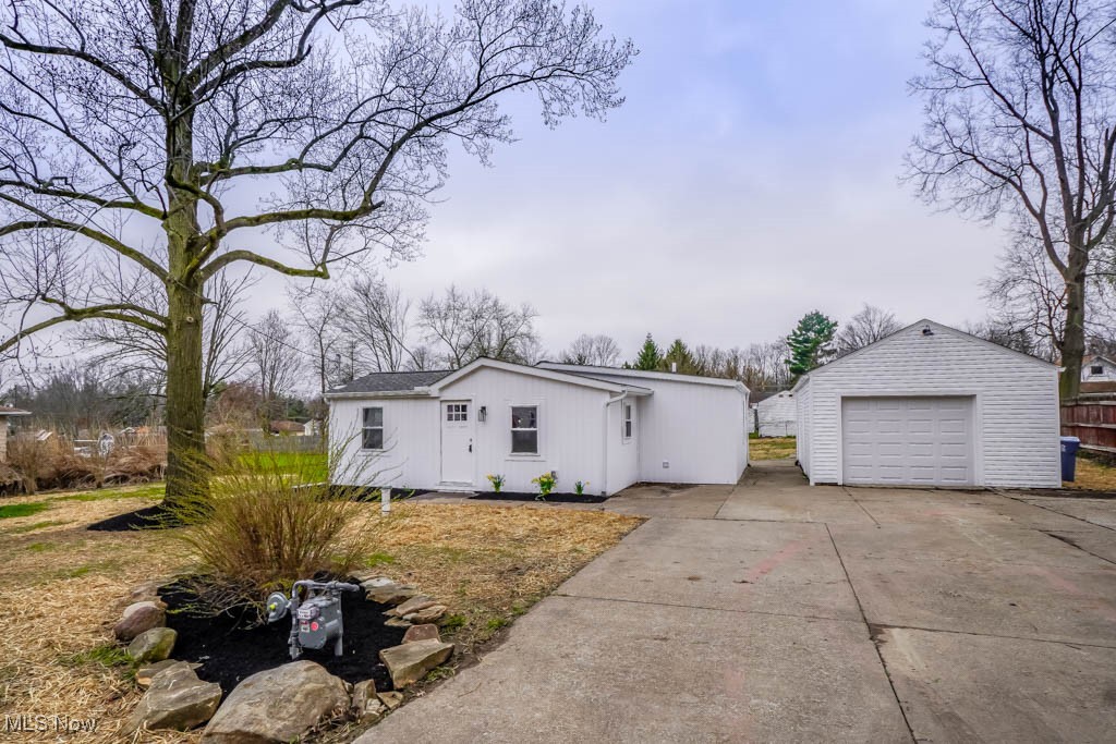 Updates galore in this 3 bedroom Springfield ranch! A new roof, windows, furnace, A/C, plumbing, electrical, well head and pressure tank mean everything's already been done for you. Enjoy true one floor living with new flooring, paint, and fixtures throughout. The open layout connects the vaulted living room to the updated kitchen, featuring butcher block counters, new cabinetry, stainless steel appliances, and a breakfast bar. All three bedrooms offer new carpet and double closets, with shared access to the remodeled full bath with a tiled tub/shower and a shiplap accent wall. A laundry closet with stackable appliances adds convenience. Outside, you'll find a large yard with a covered patio, cellar door access to the mechanicals, and an oversized detached garage. Fully renovated from top to bottom, this home is a great fit for first time buyers or anyone looking to downsize. Call today to see it for yourself!