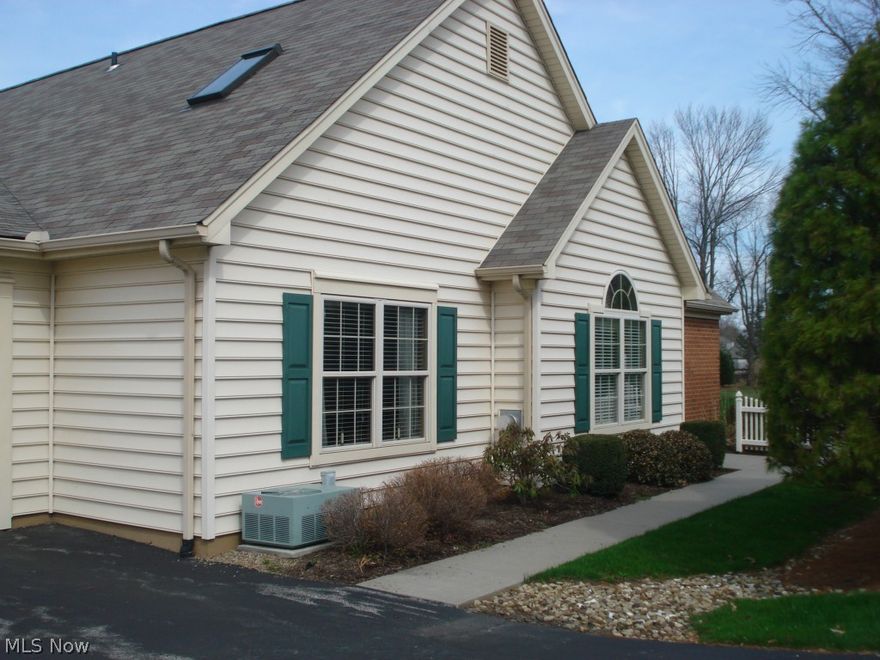 This immaculate, 3 bedroom plus office condo has many updates which incl. granite counters, cherry cabinets,  updated faucets and hardware, beautiful wood floors in laundry area, kit, dining room, sun room and foyer, spindle railing to second floor, and cathedral ceiling in LR, 2nd br, and foyer.  Microwave and Range are less than a year young, as well as their hot water tank.  Second floor includes office, bath, and 3rd br.  Also enjoy upgraded trim, crown molding, and extra cabinets in laundry.  The location of this magnificent home is very private with it's decorative brick patio overlooking the large park like backyard.  Condo asso. fee is $170 monthly.