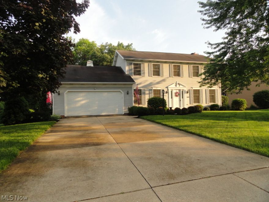 Sharp Colonial sits on deep lot overlooking woods in prestigious L'Ermitage.  Neat, clean and well maintained.  Foyer entry with open staircase.   Formal dining room and living room.  Large eat-in kitchen with Kraft maid cabinets and bay window. Kitchen opens to the family room with wood burning fireplace, bay window  and French doors to the living room or office.  Private master suite with vaulted ceiling, garden tub, shower, double sinks and skylight.  2 additional generously sized bedrooms.  21x20 newer deck and 16 ft round pool.  Newer furnace, AC and water heater.  Home warranty too!