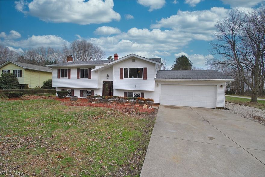 Welcome to this spacious 4 bedrooms & 2 bath well-maintained house that is ready for you to make it your home.
This semi updated Bi-Level home is waiting for your personal updates and touch. Some of the most recent updates include laminate flooring with new baseboards, a newer roof, furnace, AC, hot water tank, and windows that all have been updated within the last five years. Then go right down to the large family room currently used as a rec room that features a fireplace, full bath, and bar. The slider off the dining room leads to a sizeable deck overlooking a lovely park-like yard that is a peaceful serene. A perfect place to relax or entertain on just over a half-acre that is located in a quiet desirable neighborhood. This home sits on a corner lot that has a 2 car attached heated garage, an oversized shed in the back that is equipped with electricity, and a fenced-in garden to practice your love for gardening. One Year Americas Preferred Home Warranty included. Available to the