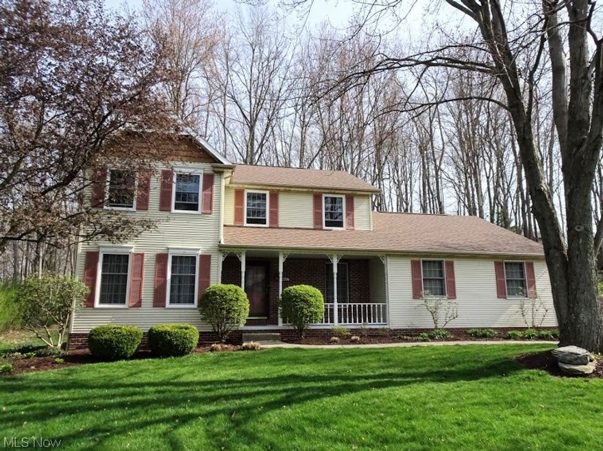 Your home search will begin and end here. In highly sought after Colonial Hills this impressive three bedroom two and half bath two story is nestled in the trees. 
The foyer entry draws you in to the open and  inviting kitchen dining areas offering newer appliances and a direct view to the great room with gas fireplace and built in bookcases. The owners suite is just what you've been searching for being 13 X 21 with  walk in closet and private bath offering both shower and soaking tub. All bedrooms are generous in size and have great closet storage. The first floor laundry offers closet storage and counter space. The first floor is completed with dining room and in home office areas. You'll love the private treed rear yard plus deck and patio areas. Many updates: Furnace 2019, central air 2020, six new windows in 2021, Dishwasher 2020, stove 2016, Refrigerator 2018, faucets and plumbing in kitchen and baths 2016, rear service door to garage 2016, neutral interior painting throughout.