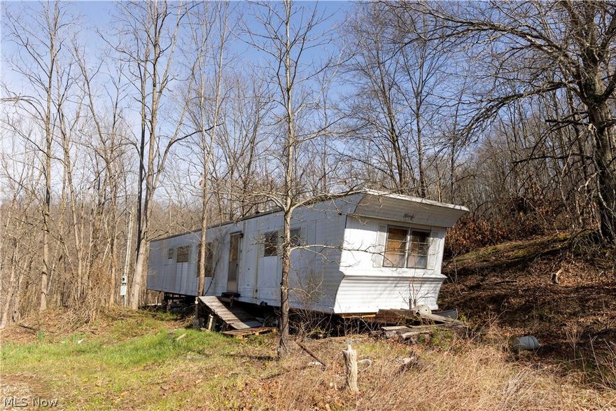 Great opportunity to own an affordable 15-acre tract just south of Zanesville with tons of potential. The property features an established driveway and a prime building site on top offering excellent views and privacy. An older trailer home is currently on the property and will likely need to be removed. There was previously a working well and septic system, but they have not been used for several years and the property is being sold as-is, with any inspections to be completed at the buyer’s discretion. All owned mineral rights will transfer with the sale. Whether you’re looking for a building site, recreational ground, or hunting property, this one is worth a look.