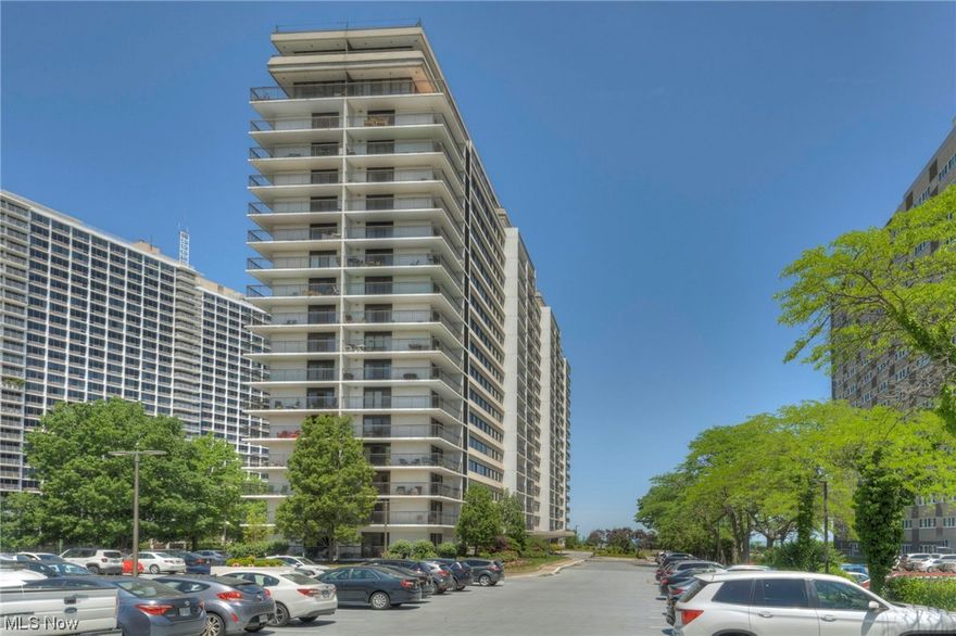 Welcome to your new home at the Meridian, where you can indulge in low-maintenance lakefront living. The Meridian offers an array of amenities, including indoor and outdoor heated pools, a hot tub, a sauna, exercise facilities, an indoor racquetball court, and a rec room with a pool table. Inside, the unit is bright and spacious, with a stylish foyer to greet you and a spacious open floor plan in the main living space. The large living room and dining area feature a beamed ceiling, wainscoting, and a cozy fireplace with elegant mantelpiece and bookcases, giving this condo a unique charm and warmth. An expanse of windows and sliding glass doors fill your home with sunlight and, calming breezes, and year-round lake views. A private balcony off the living room is the perfect place to enjoy breakfast, lunch, dinner, or a late-night cocktail while taking in peaceful views of the horizon. The large master bedroom features a walk-in closet and a private full bath with a large vanity and walk-in shower. There's also a roomy guest room and an additional full bath. The building has recently undergone many improvements, including new elevators and common areas. Plus, living in the Meridian, you're just a short drive from trendy urban locations like Gordon Square, Ohio City, Tremont, and Downtown Cleveland. And you can easily bike or walk to Lakewood's public parks and business districts along Detroit and Madison Avenues. After taking advantage of Lakewood's notable entertainment, dining, and shopping options, you'll always feel welcome coming home to the Meridian!