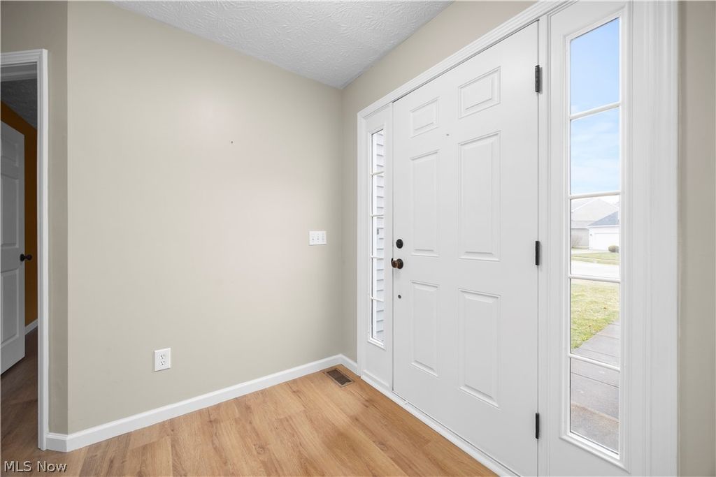 Photo of 38086 Rocky Run Court, North Ridgeville, OH 44039 (MLS # 5191471)