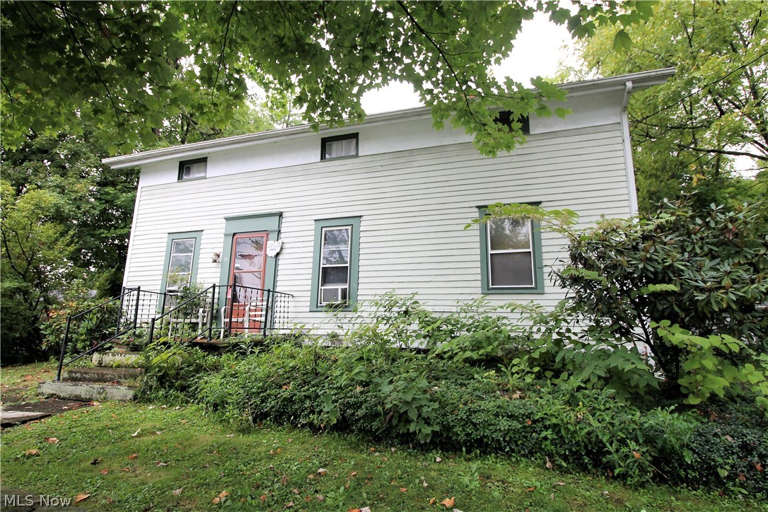Investors! Great rental Property! Or this charming home could easily be converted back to a single-family home. Welcome to this charming two-unit historical home. The one unit is currently MTM and the rent is going for $550/Monthly and is all on one level offering a living room, kitchen, bright full bathroom, one bedroom with access to the basement for the washer and dryer hookup. The second unit is currently on a lease and the rent is going for $1100/Monthly and is one and a half stories offering a living room, kitchen, full bathroom, three bedrooms, and laundry hookup. This gorgeous property is on a large lot for sitting out and relaxing or entertaining and has a detached two car garage. There is egress in the back for rear driveway. The seller currently pays for the electric- $125/monthly, gas-$80/monthly, water/sewer-$60/monthly. Residential zoning. The home is conveniently located by the highway. Some updates include boiler (2021), hot water tank (2021), storm door in cellar (2021