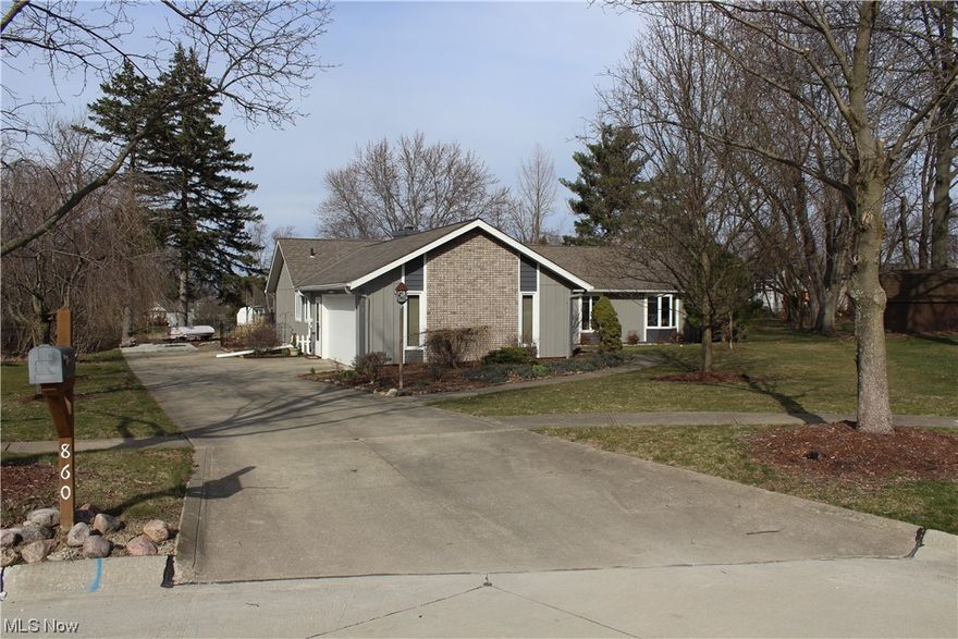 MOVE RIGHT IN to this Breathtaking Medina Ranch that Offers Approximately 3,000 Sq Ft in Total Living Space.  Over 2,000 Sq Ft Occupy the Main Floor which Flows Nicely from Formal Dining Room to Living Room (with Electric Fireplace) to Family Room/Hearth Room (with Woodburning Fireplace) to Gourmet Kitchen with Amazing Granicrete Counter Tops, High End Appliances, Newly Refinished Cabinets, and Custom Made Amish Kitchen Island.  Majority of the Main Level Offers the Rich Appeal of Engineered Hardwood Bamboo Flooring.  The "Super" Master Suite, which is an Astounding 25'x13', was Created by Combining Two Bedrooms (which could be converted back to offer a 3rd Bedroom).   The Main Level also Offers a Sizable Office as well as First Floor Laundry Room.  The Finished Basement is an Oasis of It's Own.  The Rec Room is an Incredible 34'x 20' that Boasts a Full Kitchen with new Cabinets & Granite Countertops and Newer Appliances. 3rd Fireplace (Gas) Stone with new Mantel. Vinyl Plank Flooring