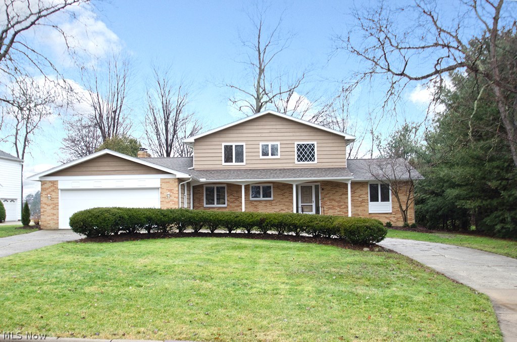 Welcome to this beautifully updated, spacious home in the highly desirable golf course community of Tanglewood Lake. Foyer entry into the large living/dining room with a expansive wall of windows overlooking the tranquil golf course, sets the tone for this distinguished home. First floor master conveniently tucked away has an abundance of closet space as well as built-in dresser, with a large private bath. Nicely updated kitchen has a separate dining area, pantry, and wood floors. Family room with new triple slider to a new deck, is oversized with fireplace, wood paneling and built-in bookcases. There is also a built-in bar for entertaining. Upper level offers 3 additional bedrooms, one with new slider to private balcony and built-in bookcases that make it perfect as an office also. Lower level is finished with full bath, complete kitchen, rec area with large bar and it's own fireplace. Highly desired for families looking for an in-law suite or private guest area. Many, many up