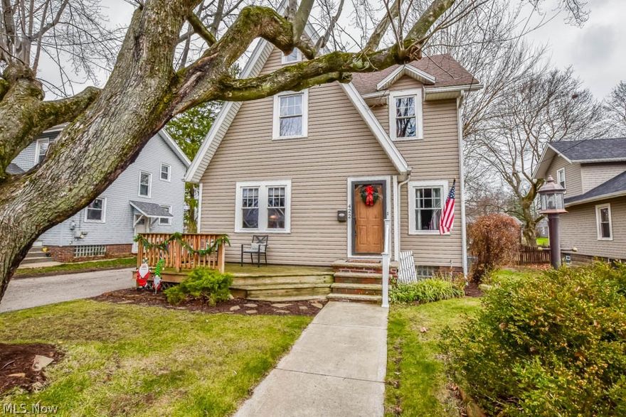 Charming storybook-style home in the heart of North Canton! A vestibule entry opens into the living room featuring a decorative fireplace and updated vinyl plank flooring. An archway leads into the dining room with a ceiling fan and darling built-in corner display cabinet. The sun filled kitchen offers tall cabinetry, modern appliances plus a breakfast nook to enjoy your morning coffee. Upstairs you'll find 3 nice sized bedrooms and an updated full bath with built-in linen storage in the hall. The full basement has been waterproofed with plenty of space for storage, laundry hookups and is plumbed for another bathroom.  Outside, you'll love the curb appeal where you can greet neighbors passing by while enjoying the front porch or you can opt for the privacy of the covered back porch with views of the park-like backyard. The tandem 2 car garage with additional parking in the private drive is an added bonus!  This home has been lovingly cared for and thoughtfully updated by the current ow