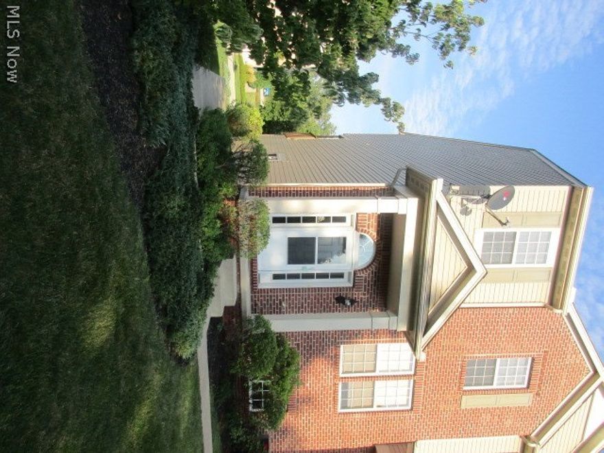 Recently renovated withupscale gray color scheme.  Sherwin Williams "Agreeable Gray" was painted throughout the condo except in the bathrooms and laundry room (washer & dryer provided) where Dover White was used.  "Warm Taupe" carpeting was laid on lower level and upper bedroom level.  Pergo Max Montgomery Apple wide plank flooring was laid at formal entrance and first floor living room and kitchen, which accentuate the 9' ceilings and 2-story entrance.   Classic cherry kitchen cabinets updated with brush nickel knobs and handles, which goes well with the stainless steel appliances. 

Lower level rec room exits to 2-car attached garage, also painted inside!  Upstairs has spacious master bedroom with adjacent bath with large walk-in shower; plus 2 bedrooms and hall bath.  This unique end unit has no building or walls in front or behind to impede your views.  Don’t let this one slip through your fingers!  Newer construction / central air.