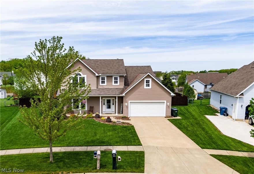 Don't miss out on this beautiful updated home in close proximity to the Wellington Reservoir and Findley State Park! Wonderful kitchen with quartz countertops and updated flooring. Upstairs features three spacious bedrooms and a bonus room with endless possibilities. Home has partially finished basement allowing a great space for a rec room, exercise area, and family room or home office; with ample unfinished storage. This property has an incredible fenced in backyard with a poured concrete patio with Sun setter power awning and stone fire pit area that is the perfect for entertaining during these upcoming summer nights! Some recent updates include: new flooring (2020), kitchen backsplash (2019), new quartz countertops (2016), foyer fan (2019), crown molding (2019), resurfaced fireplace (2019), new windows and sliding door (2017), Sun setter power awning (2018)