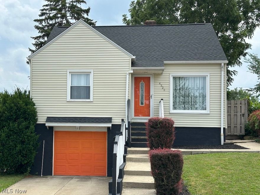 Step into comfort and charm in this beautifully maintained 3-bedroom, 2- bathroom bi-level bungalow in Parma. Located on a quiet street close to shopping, freeways and all of the action in Cleveland. As you step in you are welcomed in open Living room with tons of natural light from large picture windows. Spacious eat-in kitchen with granite counter tops and subway-tile backsplash is perfect for cooking. There are two bedrooms with newer carpeting and a fully renovated full bath on the main level. Upstairs bedroom offers so much room and an extra space! The lower level has a rec-room, laundry/ utility room and second Full bathroom. The attached extra-deep garage can fit two cars or a workshop. Fully Fenced yard! Fabulous location, close proximity to school, minutes to I-480, shopping and restaurants. List of updates include: Furnace 2023, new roof in 2024, new electric panel 2024, washer and dryer 2022, garage door operating system 2025, front door 2018, newer interior doors, windows, updated bathrooms and kitchen. Call for your private showing today!