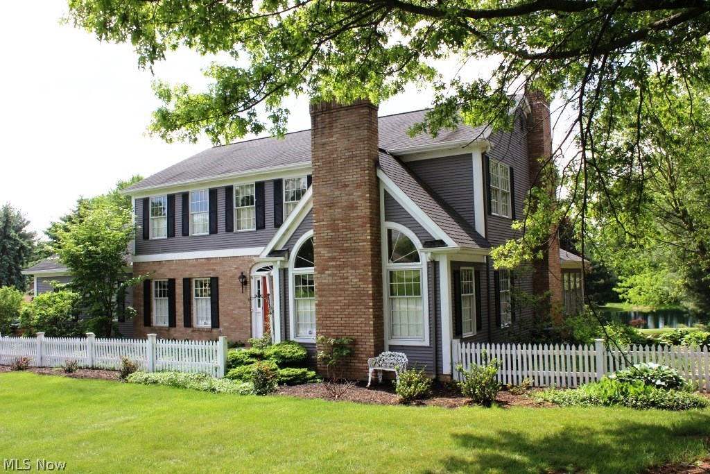 Positively outstanding 4 BR/3 BA home sitting on 1.86 acres with stocked pond* Beautifully built & maintained one owner w/2592SF plus 16x14 four season sun room, partially finished basement, 2.5 car attached plus detached 2 car or workshop with finished loft & covered patio overlooking pond* Vaulted living room with gas log fireplace, wood shutters & French slider to family room* Family room with brick wood burning fireplace, wall of built ins, double crown & atrium door leading to vaulted 4 season sun room wrapped with windows, built in seating, tile floor & access to deck* Formal dining with wainscoting, double crown, wood shutters & oak floor* Entry with oak floor, double crown, & transoms over entry to dining & living room* Schrock bayed eat in kitchen with oak floor, island, roll outs, pantry, double oven, Jenn air burner top, microwave, refrig & dishwasher* Breakfast room with oak floor, desk, cabinets & slider to deck* 1st floor laundry & 1st floor full bath* Master with new car