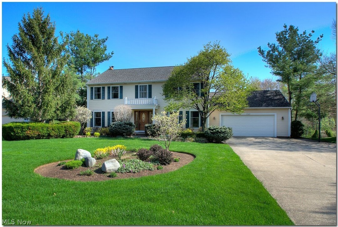 Words cannot describe this beautifully updated open concept home! Step in to the hardwood foyer and you will know your search has ended. The Living Room is currently being used as a study and has french doors that open to the family room with inviting gas fireplace. The kitchen has been renovated with top of the line materials including ceramic floors, granite, Stainless steel high end appliances, a touch faucet, walk in pantry, and huge eat in area with doors to an enormous deck overlooking a fully fenced (wrought iron) huge yard. Deck has a retractable awning. Upstairs the glamour master suite is vaulted and has a gorgeous tiled bath. The hall bath has been totally remodeled with tile and top of the line fixtures. The walk out lower level has a full bath, rec room and extra carpeted room for work-out or hobby area. Doors, windows and skylights all upgraded as well. Pantry has hook ups and can be converted to first floor laundry.