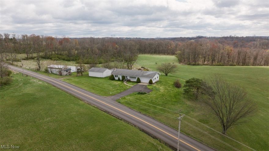 84-Acre Farm with Fixer-Upper Ranch Home & Outbuildings, Open and Wooded Land with Marketable Timber, Offered in Parcels & Entirety Ranging From 6 To 24 Acres, Loads of Wildlife. Carroll Co., Union Twp., Carrollton LSD. Live Onsite Auction with Online Bidding Available. ABSOLUTE AUCTION, all sells to the highest bidder on location. ONLINE AND LIVE ON-SITE BIDDING WILL BEGIN SATURDAY, MAY 31, 2025, 10:30 AM. Real Estate features approx. 84-acre farm having one-owner, fixer-upper ranch home with applianced kitchen, two-car attached garage, rear sunroom, living room with wood burning briarstone fireplace, bay window, three bedrooms, and full bath on the main level. Full basement with oil FA furnace and C/A, 100-amp breaker electric, walkup steps to sunroom. Home is ready for renovations. 24 X 32 outbuilding with two overhead doors. Divided livestock shed with electric. Beautiful rolling land, open and wooded with marketable timber. Loads of wildlife. Gas and oil rights do not transfer. Property divided as follows:
Parcel #1: Approx. 6.1 acres of open land with the home and buildings mentioned above.
Parcel #2: Approx. 8.9 acres of open and wooded land.
Parcel #3: Approx. 7.4 acres of mostly open land with woods in the back. 
Parcel #4: Approx. 9.8 acres of mostly open land with woods in the back.
Parcel #5: Approx. 8.1 acres of open and wooded land.
Parcel #6: Approx. 24 acres of open and wooded land.
Parcel #7: Approx. 19.5 acres of open and wooded land.
NOTE: Maps on site. Walk the land over at your convenience.