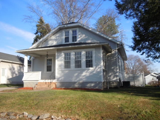 Nice vinyl sided story and a half with a fenced yard. Make this house your home. Enclosed front porch opens to living room. Hardwood floors living room, dining room and 1st floor bedrooms. Nice kitchen with ceramic floor. First Time Buyers, complete the HomePath Ready Buyer homeownership course. This is Fannie Mae HomePath property. Attach certificate to offer and request up to 3% closing cost assistance. Restrictions apply.