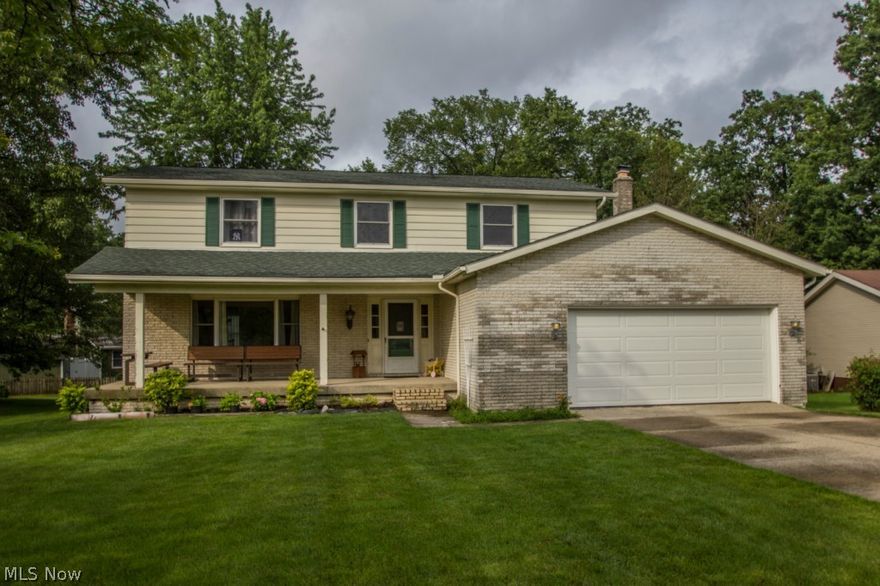 Desirable Forest Hills Colonial w/ Finished Lower Level that boasts a Lg Rec Rm, perfect for sleepovers and family movie night! Covered Front porch provides a quaint spot to read a book or have a cup of morning coffee.   Home also offers a Lg Living Rm & Formal Dining Rm w/ beautiful,  newer Laminate flooring!  Kitchen is open with a spacious casual  Dining area that includes a New Slider to the Large deck and patio!!! First floor Laundry Rm can be found off the Family Rm that has a Brick WBFP w/ wood Mantel!   Master Bedroom offers a private Full Bath w/ new updates,  New Sliding Doors to a Rooftop Deck... a Sunbathers Paradise!  Main Bath has been updated w/ new tile!  Newer windows on 2nd floor!  New Roof 2009! New Water Tank 2013/ Furnace 2014!  Home Warranty Provided! Member of Forest Hills HOA with its two Pools, Tennis Court and Play areas! Please contact us for a private tour of this beautiful home!!