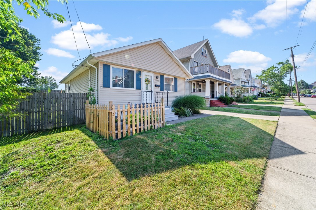 Once-in-a-Lifetime Find in Lakewood! Don't miss this rare opportunity to own a charming 3-bedroom Ranch-style home with a bonus lot—leased from the railroads for just $365/year! Built in 1970 and lovingly maintained, this move-in-ready gem is packed with updates and cozy charm. Step inside to a freshly painted interior in calming, modern tones that make every room feel like a peaceful retreat. You'll love the updated kitchen, complete with a refrigerator and range, and the stylishly updated bathroom featuring a relaxing soaking tub. The fully fenced, beautifully landscaped backyard is your own private oasis—perfect for morning coffee, pets, or entertaining. The finished lower level offers a spacious family room plus a versatile bonus room—ideal as a home office, workout area, or storage. Additional perks include: Washer and dryer included in the convenient lower-level laundry area. Waterproofed basement with a lifetime warranty. New gutters and whole-house insulation. Glass block windows for added security and light. New front patio for welcoming curb appeal. Furnace & Central Air approx. 5 years young. This happy, worry-free home is waiting for its next chapter—make it yours today!