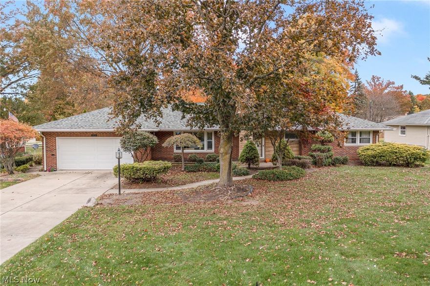 Professional photos to follow.   
Beautiful setting for this Wonderful all brick Ranch in Poland.  The back yard has an incredible wooded view and this Fall scene is amazing. The yard is newly completely fenced in.  There is a large brick patio to host backyard barbeques. The Four season room allows you to be able to enjoy all year round.  Back in the home there are Three Bedrooms with 1 and 1/2 baths on the main floor. The lower level has another full bath.  Original lovely hard wood floors throughout this home.  The kitchen is nicely updated.  Beautiful floors in the dining room and living room for make a great open area for entertaining.  The finished basement has a movie theater screen, wood burning fireplace and wet bar.  Their is ample storage downstairs as well.  Newer roof and hot water tank.  This won't last!