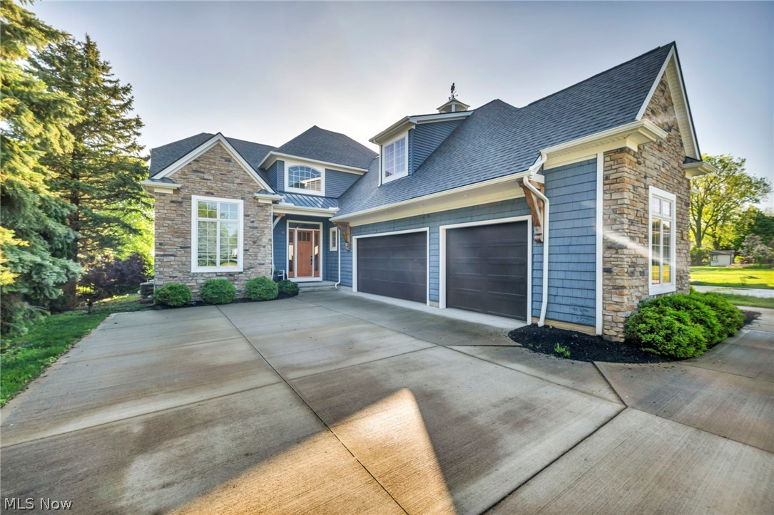 Nestled on the serene shores of Lake Erie in picturesque Marblehead, this stunning property boasts unbelievable lake views and a resort-style backyard oasis complete with an in-ground pool. Constructed in 2016, this home spans 3,253 square feet of meticulously designed living space with a 3 car garage. The lower level features a covered outdoor patio complete with a fireplace and remote screens, creating an ideal space for year-round enjoyment. Ascend to the second level to find an open-air outdoor space showcasing the homes third fireplace, perfect for relaxing or entertaining. The residence includes four generously sized bedrooms. Additionally, there is a private office currently utilized as a fifth bedroom, offering versatility to suit your needs. The resort-style first floor primary suite serves as a luxurious retreat, ensuring comfort and tranquility. The heart of the home is open concept kitchen and family room, featuring tall ceilings and a cozy fireplace. The gourmet kitchen is equipped with stainless steel appliances; two islands, and custom woodwork throughout. Every detail has been thoughtfully curated; the home is professionally decorated and sold fully furnished. Adjacent to the kitchen, the sunroom offers breathtaking views of Lake Erie, providing a serene space to unwind. The upper level houses three bedrooms two full baths and a spacious gathering room complete with a bar and walk-out patio, which includes the homes third fireplace. This area is perfect for hosting gatherings and enjoying the stunning surroundings. Additional features include custom remote window coverings throughout, ensuring convenience and privacy. This exceptional property blends luxury and comfort, offering an unparalleled lifestyle in a magnificent lakeside setting. Whether you're seeking permanent residence or a second escape, this Marblehead gem is a rare find, promising beauty, elegance, and tranquility.