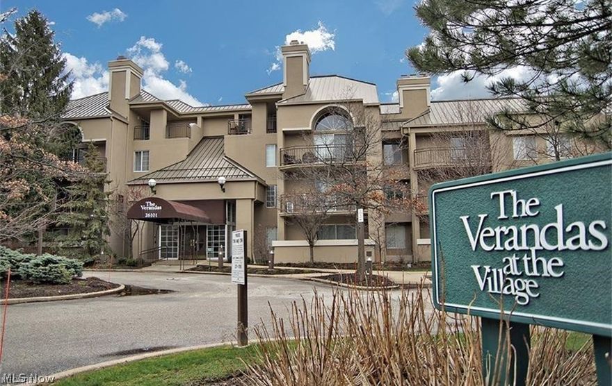 Opportunity to live in the highly desirable gated community of The Village in Beachwood. This bright, neutral, 2 bedroom 2 full bath unit w/ lovely veranda is move-in ready. Updated kitchen with refinished cabinets, granite countertops, and stainless steel appliances. Kitchen has a lovely open view to the spacious living room and dining area. Stylish corner fireplace surrounds open space. Sliders to the charming veranda. Large master bedroom with en suite master bath. Additional bedroom being used as office. En suite WASHER AND DRYER. Use of ALL the amenities the Village has to offer.....pool, tennis courts, health club , clubhouse...etc. Easy to show.....(Maintenance fee also includes basic cable in addition to water and sewer).