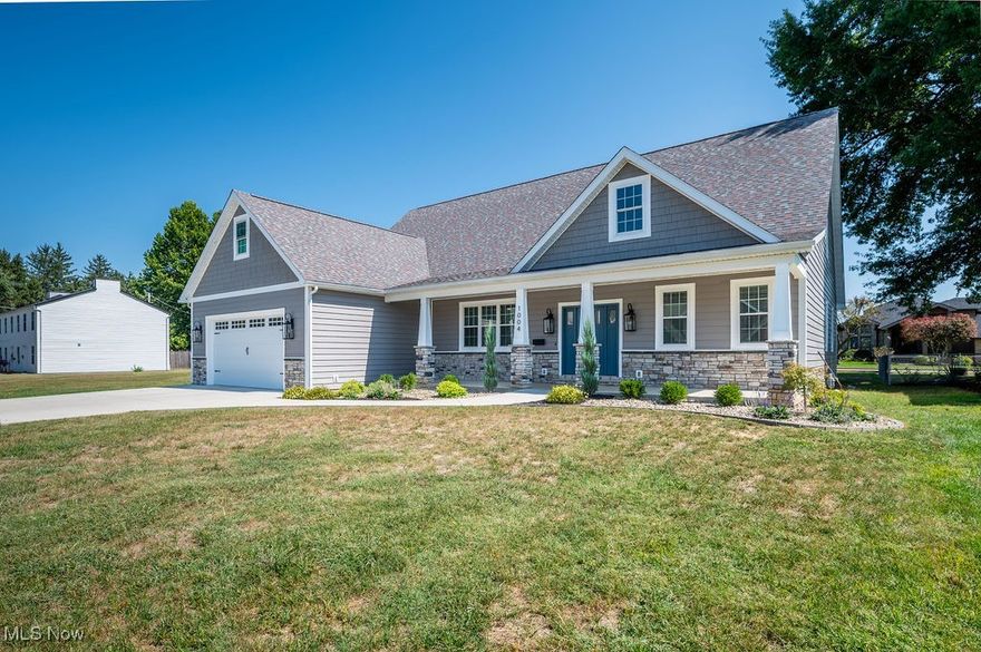 Nearly new home in Belpre!  This beautiful Craftsman style home is less than 2 years old and ready for new owners!  This expansive home has 4 bedrooms (5 if adding bonus space!) and 3.5 bathrooms!  From the moment you walk in, you'll appreciate the roominess and amount of natural light.  9' ceilings enhance the main level, which has an open concept layout to the living areas.  A room just off the entry can be used as a bedroom or office space.  The great room is anchored by a gas fireplace, and has a den just off the side.  The gorgeous custom kitchen with massive island is sure to be a gathering place for family and friends, and features soft close cabinetry and high end stainless appliances.  A dedicated dining space ensures plenty of seating for meals, with access to the rear porch.  The primary suite is located on the main floor- a convenient retreat for the owner, which features two walk-in closets, and a spa-like bath.  The main level also has a laundry room and half bath, on either side of the entry from the two-car garage.  Upstairs there are two more bedrooms (one with it's own en suite) and another full bath.  A large room is great for a family room or rec room, and a bonus room over the garage is great for storage or could easily be used as a 5th bedroom!  High end laminate flooring, and quality insulated vinyl siding.  Dual HVAC units ensure comfort and efficiency, and the age of the home and builder reputation instill confidence in your investment. Don't miss out on this beautiful bespoke home in Belpre!