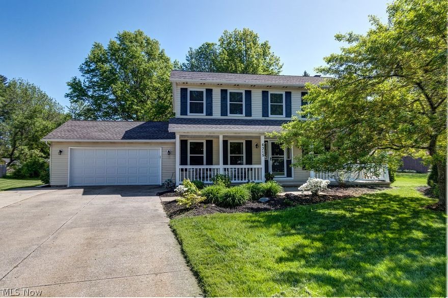 Updated Colonial On A Private Mentor Cul-De-Sac! 4 bedrooms / 2.5 baths. You will fall in love at your first view from the curb! Lovely landscaped yard with a large, welcoming front porch. The spacious eat-in kitchen has been refreshed with granite counter tops, updated cabinetry and new sink. All bathrooms have also been completely remodeled with new tub and shower surrounds, light fixtures, commodes and granite topped vanities with Moen fixtures. Engineered hardwood floors run throughout from the front entryway into the dining room and kitchen. A cozy, wood-burning brick fireplace accents the family room. Sliders give access to the large outdoor deck, just perfect for family barbeques! Separate formal living room and half bath complete the main floor. More updates include windows (2018), newer paint, carpeting (2018 and 2020) and light fixtures (2019). Upstairs are 4 sizeable bedrooms, including the master suite with private full bath. The full, unfinished basement and an attached 2-