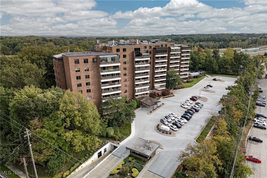 This exceptional ground-level residence at Point East offers 3,100 square feet of elegant living space, PLUS an expansive sunroom, creating additional usable space rarely found in condominium living.
The spectacular sunroom—accessible from the main living area—is a true showstopper, opening directly to your own private outdoor garden and patio. This rare combination of indoor and outdoor space brings a new level of lifestyle and flexibility, perfect for entertaining, relaxing, or simply enjoying the seasons.
Inside, you’re welcomed by a grand marble foyer leading into a spacious living room, where oversized windows, a custom built-in bar, an electric fireplace, and formal dining space create a refined yet inviting atmosphere. The gourmet kitchen is a chef’s dream, outfitted with stainless steel appliances, granite countertops, and a tray ceiling. A cozy den with beautiful built-ins sits just off the foyer, ideal for a reading room or media lounge.
The generously sized primary suite features a walk-in closet and a luxurious, renovated bath with a heated towel rack. A second bedroom, two additional full baths, and a powder room complete the well-thought-out floor plan.
Adding to the convenience are two prime, assigned parking spaces ideally located near the garage entrance — a major bonus in this full-service building.
Point East delivers the ultimate in luxury amenities, including a 24-hour guarded entrance, on-site manager, exercise room, party room, outdoor swimming pool, tennis courts, and grilling patio.

A unique opportunity to enjoy luxury living with private outdoor space, expansive interiors, and unbeatable amenities — all in one of Cleveland’s premier addresses.