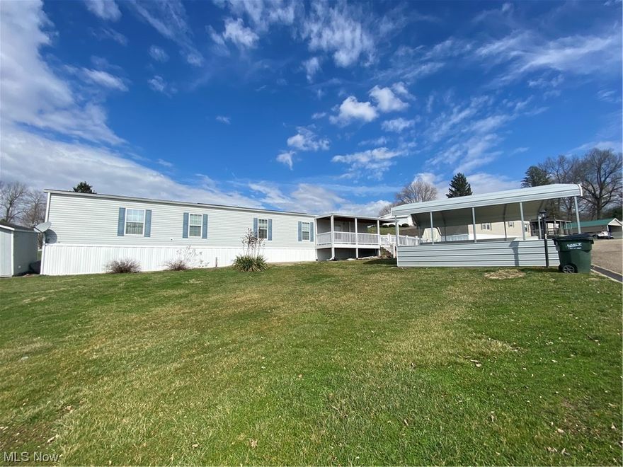 Nice mobile home in well maintained neighborhood. Lot rent is 325.00 per month. Newer composite deck and ramp. Newer skirting. Kitchen has sliding door leading to covered porch. Stackable washer and dryer stays. One storage shed will stay .This is a 3 bedroom but they have put a stackable washer and dryer in 3rd bedroom