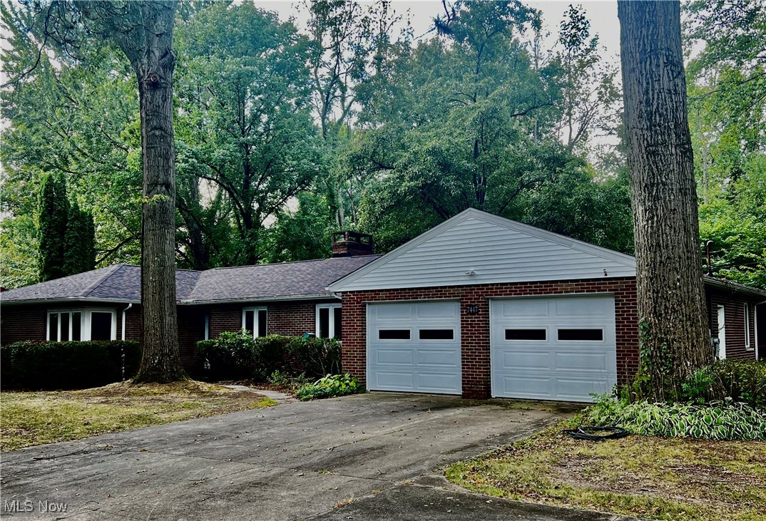 A rambling Twin Lakes brick ranch with a park-like setting. You'll enjoy grilling off your private back screened porch, while enjoying the wildlife and privacy this home offers. The basement features a large rec room with fireplace and workshop area. The lifestyle of Twin Lakes offers you the ability to enjoy 2 lakes, beach area, fishing, boating, swimming and many special events offered through the year. With your personal touches this home has amazing potential.