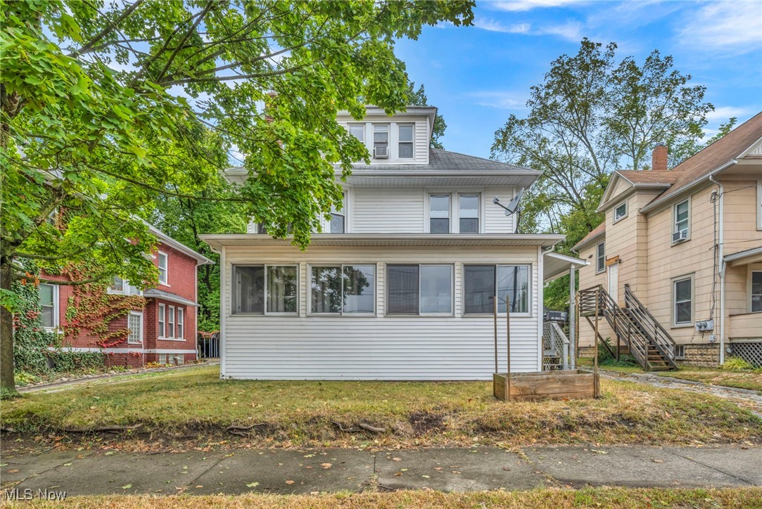 Spacious home in beautiful, historic Highland Square!
Newer kitchen, fully applianced, with large dining room seating area and bay widows. Living room/family room combo with access to your front enclosed sun room with a wall of Southern exposure windows.
Two stairwells off living room and kitchen lead to the second floor bedrooms. Upstairs hallway has wood built-ins and each bedroom has tons of closet space! Large full bath recently updated on second floor. Bonus room on third floor can be used as a fourth bedroom or additional living space. Natural woodwork, ceiling fans, and updated flooring throughout.
Basement has laundry hook up with washer and dryer included. Two car detached garage with man door, space for a workshop, and plenty of storage. Large concrete patio with privacy fencing in back.
Located just minutes from the vibrant heart of Highland Square's restaurants and retail and King Elementary (Akron Public Schools).