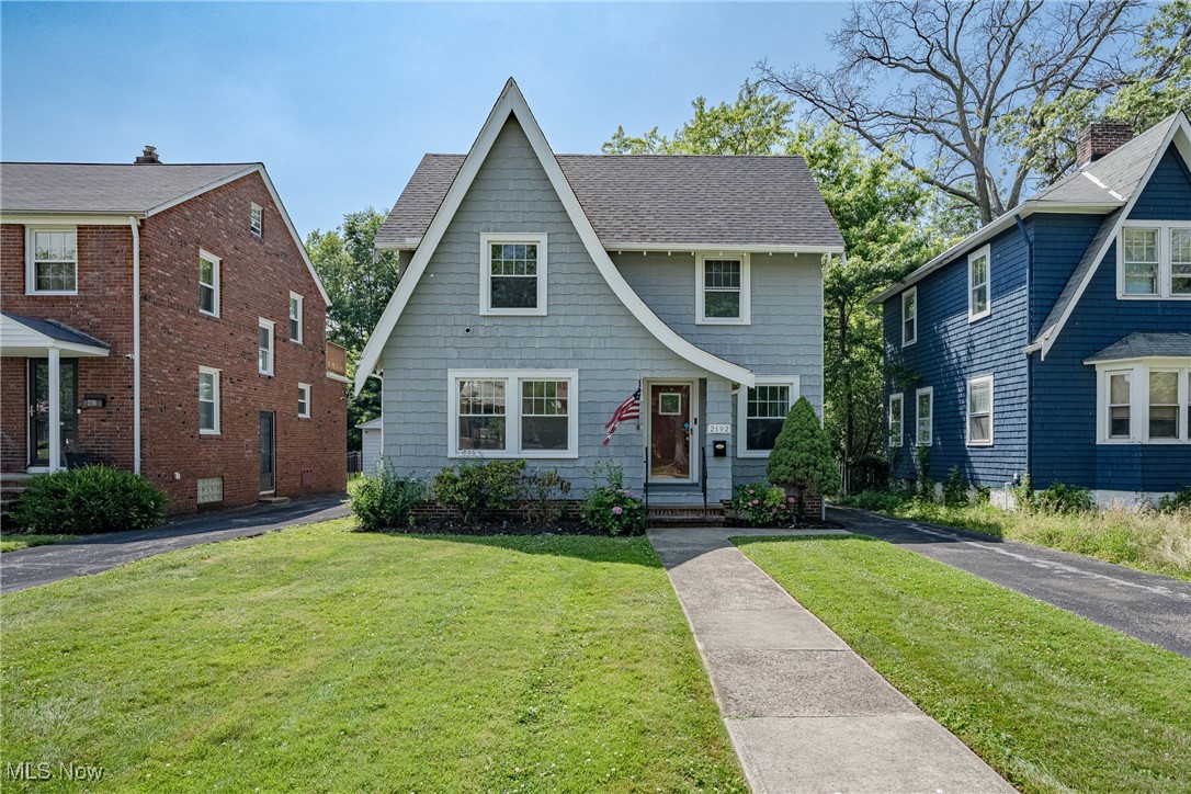 Welcome to 2192 Barrington Road - a classic Colonial in the heart of University Heights, thoughtfully improved to offer comfort, longevity, and peace of mind. With over 2,000 square feet, four bedrooms, and two full baths, this home pairs timeless character with rare, high-value upgrades that few in the area can match. Original hardwood floors throughout most of the main level add warmth and charm, while a wood-burning fireplace centers the living room. The kitchen features new stainless steel appliances (2023), well-maintained cabinets and laminate countertops from a prior renovation - move-in ready with potential to customize over time. Upstairs, three bedrooms feature brand-new carpet (2025), and a fourth finished room on the third floor offers flexibility as an office, guest room, or creative space. A second full bath on the upper floor adds convenience, and the large-capacity washer and dryer (2022) are located in the dry, waterproofed basement. The home’s major systems have all been addressed: new roof and gutters (2024), full 200-amp electrical service upgrade with surge and lightning protection (2023), new HVAC system (2022), full basement waterproofing (2022) in anticipation of finishing the basement. Also added in 2022: a whole-house water filtration system with ionization and a security system. Many of the sidewalks were either leveled or replaced (2022), and the garage was rebuilt on its original slab (2020). With the big-ticket items already taken care of, the next owner can enjoy low-maintenance living - and still have plenty of room to make the home their own.