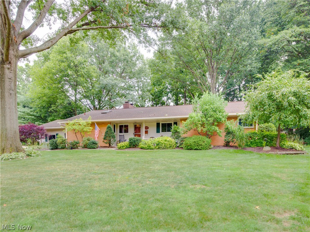 Stunning Silver Lake Ranch! Updated to perfection, this 3 bedroom 3 full 1 half bath home boasts a large formal living room with a gas fireplace. The spacious formal dining room also includes a recently refaced fireplace and built in bookcases. A 20 x 20 Sun room with vaulted ceilings is located off of the dining room and allows for spectacular views of the back yard. The renovated kitchen is every cooks dream. Featuring birch cabinetry with pull-out shelving, granite countertops, stainless steel appliances, an island with a Silestone counter top that comfortably seats 4, and quality vinyl floating flooring. The laundry room and 1/2 bath are conveniently located off of the kitchen. The sizable master suite offers French doors to the patio and roomy his/her closets. The ensuite bath includes double sinks and a separate shower room with a large tiled, glass wall shower. There are two additional bedrooms and an updated full bath with a skylight. The finished basement includes a re