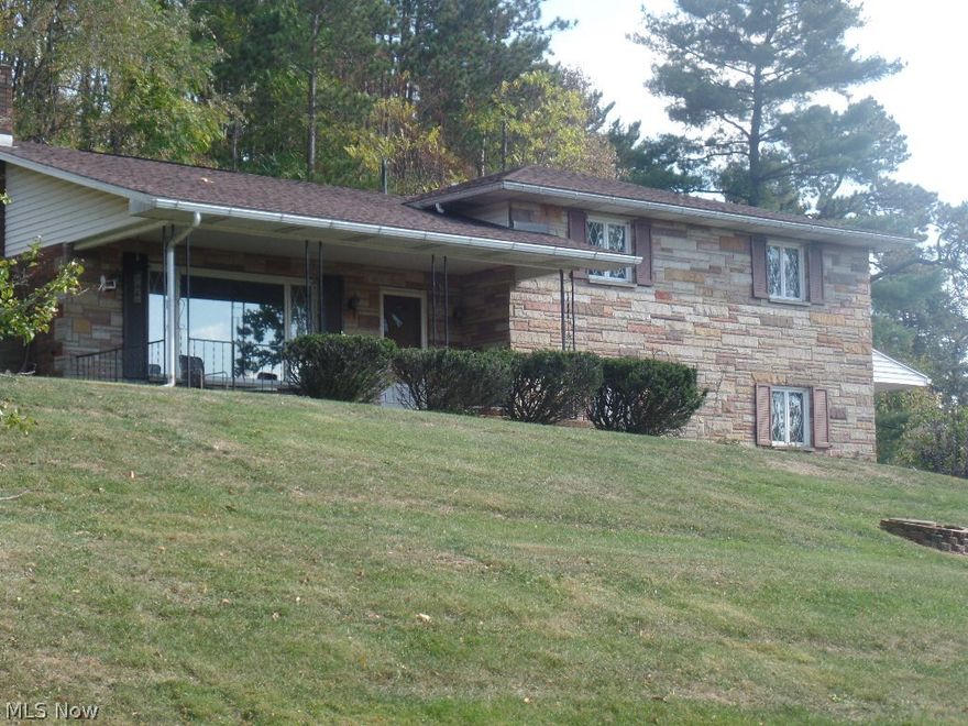 Quality Built - One Owner home for this lovely 3-4 bedroom Quad-level, just outside of town, 2 car attached garage, newer hot water boiler/furnace - 2 zones, central air, 2 beautiful hand made stone fireplaces, newer kitchen with breakfast bar, all appliances included, dishwaser is new/Kitchen, hot water tank new in Nov.'15, & garbage disposal Nov. '15.  Master bedroom w/half bath and large closets, guest bath w/double lavatories, glass sliders to back patio, partially fenced for swimming pool or pets, newer floor coverings, lower level would make a nice apartment includes kitchen, bath, family room w/fireplace & possible 4th bedroom.  In-ground swimming pool was filled-in approximately 5 years ago.