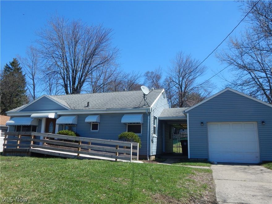 Adorable and affordable!  Step saving Ranch, Featuring two nice size bedrooms, Newer carpet in living area,  updated newer eat in kitchen. Freshly painted interior, handicap ramp on front for easy entry. Covered porch area to detached garage. Private rear yard. Very Convenient location on bus route. Near shopping, parks and schools. Move in condition. Glass block windows, updated heating system, waterproof basement. call to see today!