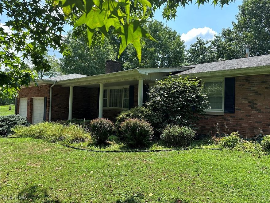 Welcome to this nice, 3 Bedroom, 2 1/2 Bathroom Ranch Brick Home with 2 car garage located in the Village of Woodsfield in a private setting on 3 parcel lots.  Home features cozy living room with gas fireplace, private front porch, side deck, dog kennel, nice master bedroom with master bathroom.  All three bedrooms are nice size with plenty of closet space.  Home features Village of Woodsfield Utilities for electric, water, sewer, dominion gas and central air conditioning.  Washer, Dryer, Frig, Stove, and dishwasher all included in the price.  This home has a heated 2 car garage with plenty of storage cabinets with garage door openers. The main floor has 1152 sq feet of living space Plus 1152 sq ft of unfinished basement.    Roof was replaced approximately 10 years ago; Furnace / Hot water tank less than 10 years ago. Windows replaced with double pain wood & Storm Pella. Mineral rights owned by the current seller will transfer to new buyer.   This home is a must see, Schedule your apt today !