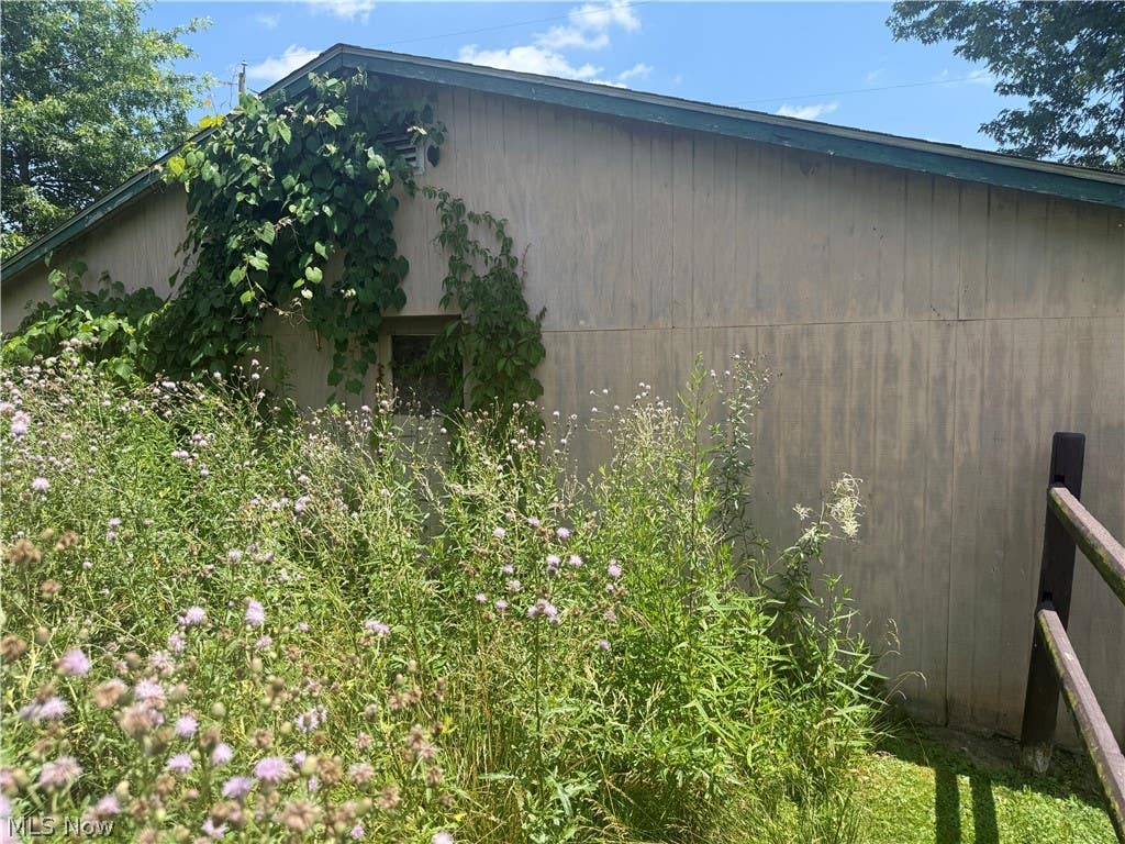 Photo of 311 Mcconnell Street, Uhrichsville, OH 44683 (MLS # 5224302)