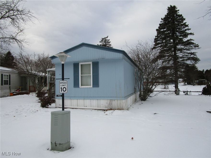 Enjoy easy one floor living with peaceful views of a sunlit pond - right from your back yard. Clean, move in ready and the seller is including the kitchen appliances. Extra storage is provided by the handy pantry in the kitchen and both bedrooms offer plenty of closet space!Taxes are unbelievably low, at just 94.00 per year, and the 8 x 8 shed is included. Parkwood Village offers a clean, well kept park with a peaceful rural vibe. Wind through the curving streets, past the tranquil pond with its floating geese and enjoy the mature trees scattered throughout. This spot is just minutes from Route 11, Route 84, shopping, fine dining, Lake Erie, historic Bridge Street, medical facilities, parks, beaches, wineries and more. Management must approve all buyers in this established 35+ years park. Ask your Agent for the forms, rules, regs, etc that are provided in the supplements section. Current rent is 259.00 per month. See the supplements for charges for pets, and discounts for seniors, in the supplements section.There are a few pet restrictions. Residents pay their own water, sewer, heat, electric and trash. Residences must be owner occupied; no renting, leasing or sub-leasing is permitted.This is a 1991 Skyline Rebel, Title # 0400854760, Serial #03390339D.. No cash? Need a loan!? The Listing Agent can provide contact info for a few potential mobile home lenders - have your Agent reach out!.