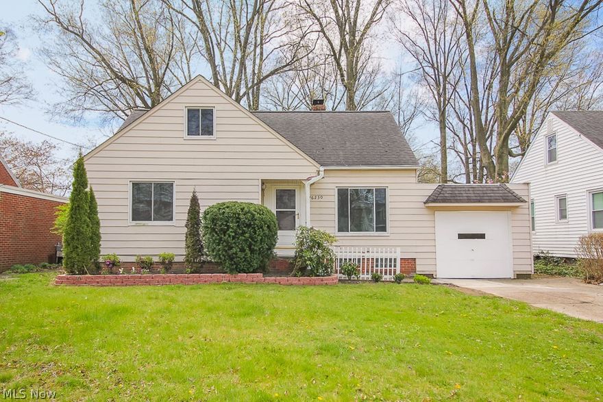 This great cape cod will make a lovely home full up modern updates the family will love! The home is full of bright natural light, beautiful hardwood floors and other charming details! The main floor offers a large, open living room and dining room with french doors that open onto the rear deck, an updated kitchen with custom cabinets for plenty of storage space and all appliances as well! There are 2 bedrooms and the full bath conveniently located on the 1st floor as well, and upstairs is a large master bedroom with built-in closet and storage space. Plus, there is a partially finished basement to offer the family a cozy rec room or perfect home gym area, as well as a laundry area and workspace. Outside the spacious rear deck overlooks a private, wooded backyard, stone patio and great playground set that will stay with the property! This home also has an attached garage, newer roof, newer hot water tank and newer high efficiency furnace! The whole family will love to call this charmin