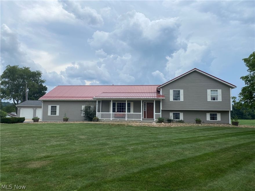 You don't want to miss this one! Beautiful multi level home on an acre of ground. Large deck , leading to an above ground pool. 2 car attached garage and a bonus of a dettached 3 car garage, with its own electric! Walk into an open concept living room,dining room and kitchen. Living room has lovely stone gas fireplace. All stainless steel appliances stay. Laundry room and half bath are off of the dining room. Master bedroom has walk in closet and nice large bath, TV stays. Family room in lower level has pool table .New metal roof within the last few years