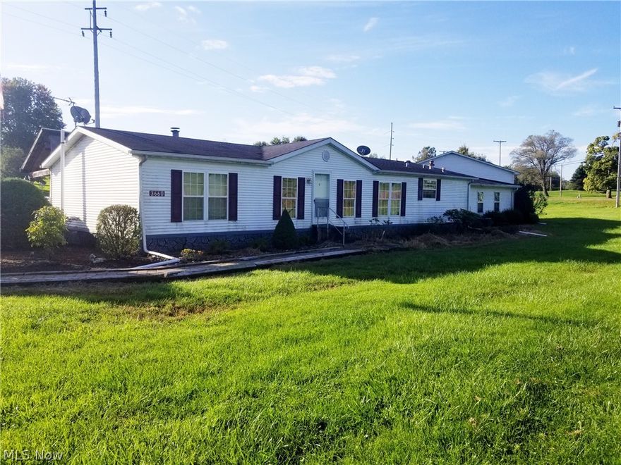 Online Real Estate Auction - Ending: November 5, 2018 @ 5:00 PM - DOUBLE WIDE ON 2.85 ACRES - Columbiana County ~ Salem Twp. ~ Leetonia Schools - Nice 3 bedroom, 2 bath double wide sitting on a 2.85 acre corner lot in beautiful Salem Township. The home is carpeted throughout with natural oak trim.  It has an open floor plan with a large kitchen w/ breakfast bar, dining and living room.  The kitchen, bathrooms and laundry room have vinyl floors. There is a large breezeway added on with excellent storage leading in to a large 24x32 garage. There is an extra-large rear porch that spans 56 feet.  The home is in good condition and would make a lovely place to start a family or downsize into smaller quarters.  The dishwasher and GE gas range to stay with home. 
Online RE Terms:  10% down within 2 business days of the end of the auction balance due upon delivery of deed and title guarantee. The property will sell subject to seller confirmation. Property sells AS IS.  Please review the full l