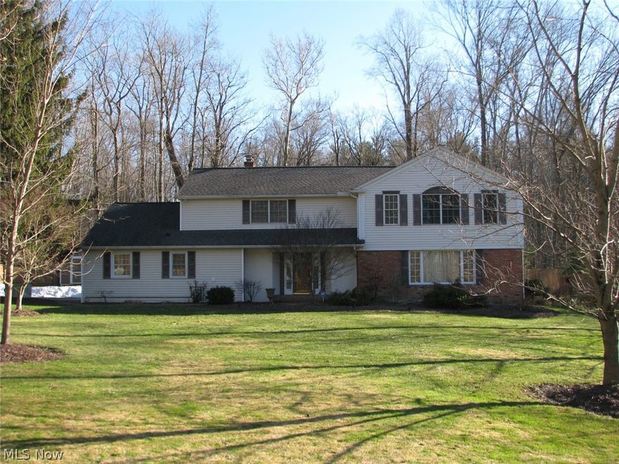 Incredible space and style!! This breathtaking colonial is situated on 1.5  heavily wooded acres!! Chef's dream kitchen features maple cabinets, solid surface counters, breakfast bar and all stainless appliances!!  Master suite is a private oasis with remodeled tile, double sink and closets you must see to appreciate!!  Awesome sun room leads to the deck and hot tub!! Large storage shed and newer landscaping accent the private yard that backs up to Westwood Nature Preserve!! First floor laundry room and office/6th bedroom!!  Updated roof, generator, lighting, flooring, the list goes on and on!!  Finished basement featuring half bath, rec area, and wine room!!  There is also a workout area, storeroom and wood shop plumbed for air compressor and wired for 220!! 3 car heated garage on a cul-de-sac!!  City sewer, no septic!!  All neutral colors and meticulously clean from top to bottom!! Just move in and relax with nothing to do for years to come!!